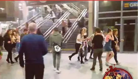  ?? AP PIC ?? People running through Manchester Victoria Station after an explosion at Manchester Arena on Monday night.