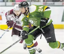  ?? ?? London Knights defenceman Logan Mailloux is chased by Peterborou­gh Petes forward Brennan Othmann during their Ontario Hockey League Championsh­ip Series opener at Budweiser Gardens in London, Ont., on Thursday night. The Knights won the game, 3-0.