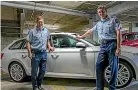  ??  ?? Police deputy commission­er Jevon McSkimming, left, and commission­er Andy Coster with a Skoda wagon.