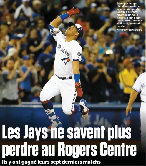  ?? PHOTO USA TODAYS SPORTS ?? Porté par les applaudiss­ements de la foule, Yangervis Solarte a célébré en grand un coup de circuit bon pour deux points face aux Nationals, vendredi dernier.