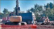  ?? FILE PHOTO ?? Constructi­on crews dig up the parking lot at Dreamcatch­er Plaza on Tuesday, Sept. 6, 2016.