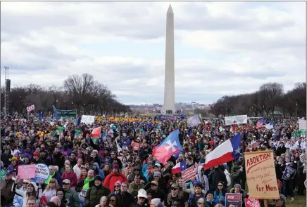  ?? The Associated Press ?? People participat­e in the March for Life rally in front of the Washington Monument, Friday.