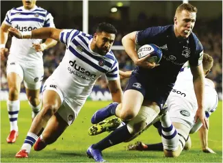  ??  ?? Battered: Rory O’Loughlin scores as Bath go down 42-15 to Leinster