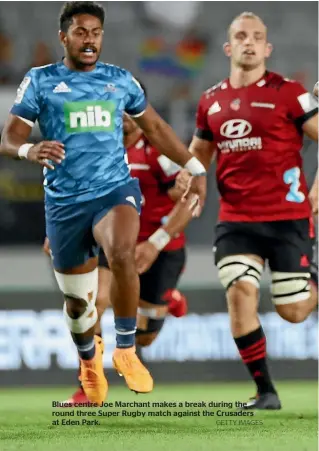  ??  ?? Blues centre Joe Marchant makes a break during the round three Super Rugby match against the Crusaders at Eden Park. GETTY IMAGES