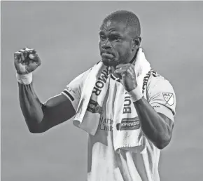  ?? GAELEN MORSE/COLUMBUS DISPATCH ?? Defender Jonathan Mensah celebrates with fans in Mapfre Stadium after a shutout win over Nashville SC on Sept. 19.