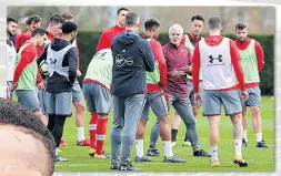  ??  ?? MAKE A MARK Hughes at first training session this week