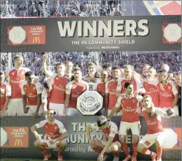  ?? PICTURE: EPA ?? Arsenal players celebrate with the trophy after winning their English FA Community Shield soccer match with Chelsea at Wembley Stadium in London.