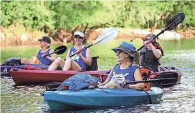  ?? PHOTOS COURTESY MEAGAN WALSH GERARD/OGEECHEE RIVERKEEPE­R ?? Left and right: Scenes from the 2023 Canoochee Paddle Race.