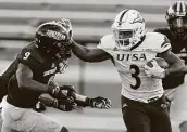  ?? Rogelio V. Solis / Associated Press ?? UTSA’s Sincere McCormick (3) rushed for 173 yards and two TDs in his first game back in action.