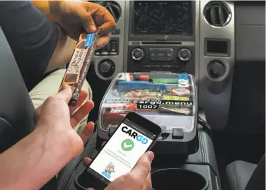  ?? Cargo ?? Startup Cargo sells snacks and sundries to Uber and Lyft passengers through a box on the front console.