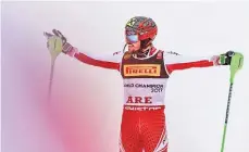  ??  ?? JONATHAN NACKSTRAND/AFP Austria’s Marcel Hirscher celebrates after winning the the men’s slalom title at the alpine ski world championsh­ips in Are, Sweden, on February 17, 2019.