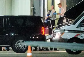  ?? AP/The Cincinnati Enquirer/SAM GREENE ?? Otto Warmbier, a 22-year-old college student released by North Korea after being detained for 17 months, is carried off an airplane Tuesday night at Lunken Airport in Cincinnati.