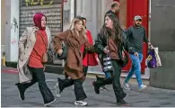  ?? ?? People leave the area after an explosion on Istanbul’s popular pedestrian Istiklal Avenue on Sunday. — ap