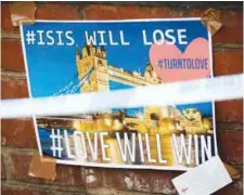  ?? AFPPIX ?? A poster on a wall reads ‘ISIS will lose; #Love will win’, at a police cordon near Borough Market in London yesterday.