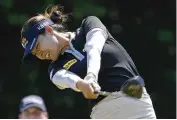  ?? AP ?? In Gee Chun, of South Korea, hits her tee shot on the 18th hole during the final round of play in the KPMG Women’s PGA Championsh­ip Sunday in Bethesda, Md.