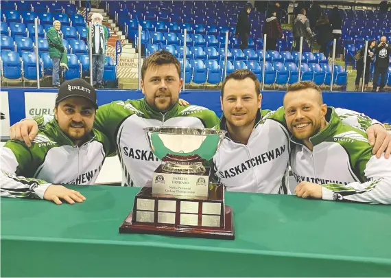  ?? MURRAY MCCORMICK ?? Matt Dunstone, left, with his Regina team, Braeden Moskowy (third), Catlin Schneider (second) and Dustin Kidby (lead), beat Kirk Muyres 4-2 to take the Sasktel Saskatchew­an Tankard men’s curling championsh­ip on Sunday. Dunstone and his team will now represent Saskatchew­an at the Brier Feb. 28-March 3 in Kingston, Ont.