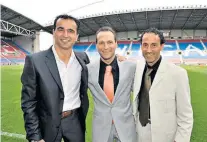  ??  ?? Wigan peers (right and above): Jesus Seba, Roberto Martinez and Isidro Diaz; (below) Martinez with the FA Cup in 2013