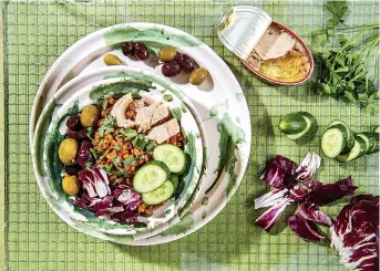  ?? Tribune News Service ?? ■ Well-seasoned farro with your favorite proteins and vegetables makes for a delicious grain bowl.