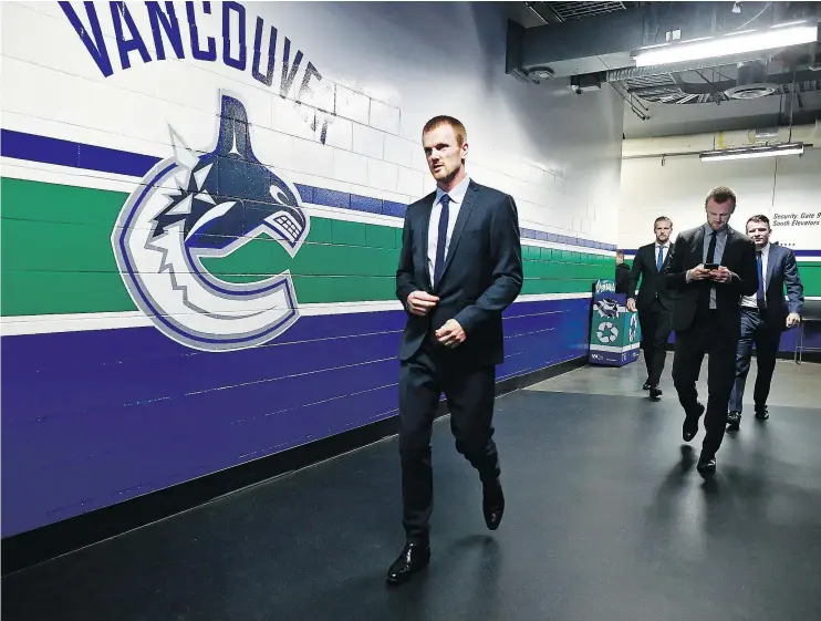  ?? — GETTY IMAGES FILES ?? Daniel Sedin looks fit and focused as he arrives at Rogers Arena for a game earlier this season. At 37, he remains a team leader, both on and off the ice.