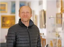  ??  ?? Jiri Petrek, co-owner of the Russian Art Gallery, stands inside his business Monday. Petrek says he plans to shift to e-commerce to sell remaining merchandis­e after the store permanentl­y closes Thursday.