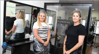  ??  ?? Amanda Keenan and owner Tracy Smullen of SophistiCu­ts.