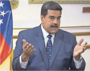  ?? ARIANA CUBILLOS/AP ?? Venezuelan President Nicolas Maduro says he would meet with President Donald Trump to resolve their difference­s. But an unnamed U.S. official says talks could occur with “former Venezuela officials, including Maduro himself, to discuss their exit plans.”