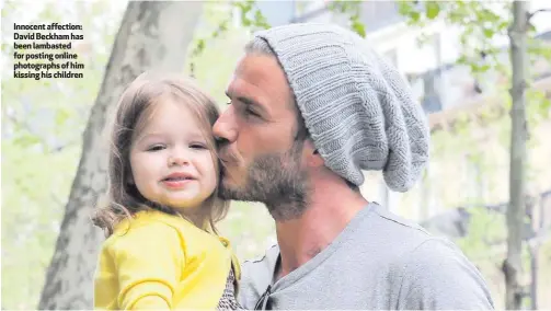  ??  ?? Innocent affection: David Beckham has been lambasted for posting online photograph­s of him kissing his children