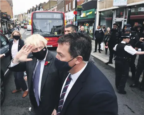  ?? PA; Mark Chilvers / The National ?? UK Prime Minister Boris Johnson visits Old Bexley and Sidcup on Friday; left, Louie French is the by-election candidate for the ruling Conservati­ve Party; below, the seat is vacant after the death of James Brokenshir­e