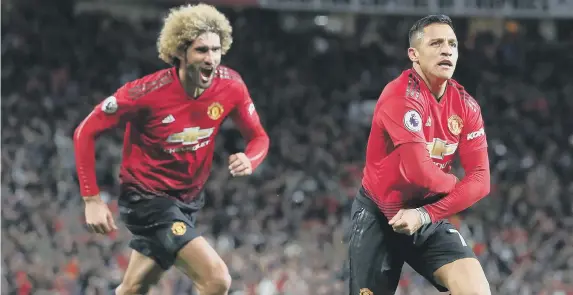  ??  ?? Alexis Sanchez celebrates Manchester United’s winner on Saturday evening.