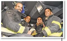  ??  ?? Nathan, Jason, Robert and Stephen Thomas (top left to right) all work for the FDNY in Brooklyn. Above, dad Robert and his sons smile as they ride a rig.