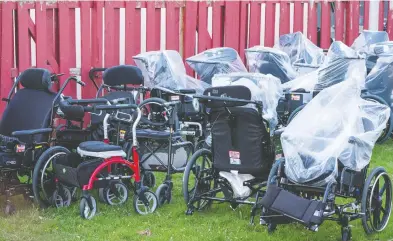  ?? FRANK GUNN / THE CANADIAN PRESS ?? Wheelchair­s on Tuesday of some of the residents of Camilla Care in Mississaug­a who have lost their lives due to
COVID-19. Long-term care home residents have been particular­ly susceptibl­e to the virus.