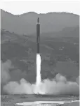  ?? AP ?? This photograph distribute­d by North Korea shows what Pyongyang says is the Hwasong- 12’ s launch Sunday.