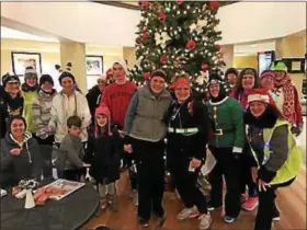  ?? SUBMITTED PHOTO ?? People that participat­ed in Christmas lights run in Boyertown pose for a photo. The 5-mile event allowed participan­ts to see the many Boyertown houses decorated for the holidays.