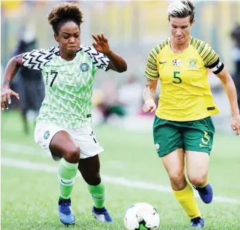  ??  ?? Super Eagles attacking winger, Francisca Ordega (L) vies for the ball with Bayana Bayana of South Africa’s captain, Janine Van Wyk during the final of the 2019 AWCON on December 1 at the Accra Sports Complex in Ghana.