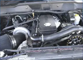  ??  ?? Aquino’s 6.7L Cummins was able to crank out 920 hp and 1,350 lb-ft of torque with a careful selection of parts and pieces that maximized both power and reliabilit­y. A Fluidampr, ARP 625 head studs, a fire-ringed head, and selection of valvetrain parts...