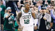  ?? AP ?? Boston Celtics guard Terry Rozier celebrates after driving to the basket late in the fourth quarter against the Philadelph­ia 76ers in Game 5 of an NBA basketball playoff series in Boston on Wednesday. Rozier scored 24 points as the Celtics defeated the...