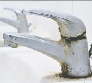  ?? ISTOCKPHOT­O ?? Black grit around facets or shower heads could be mould, but it’s more likely oxidized manganese.