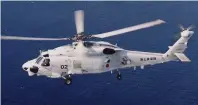  ?? (The official website of the Japan Maritime Self-defense Force via AP) ?? This undated photo released by and taken from the official website of the Japan Maritime Self-defense Force, shows an SH-60K chopper.