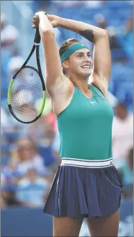  ?? Catherine Avalone / Hearst Connecticu­t Media ?? Aryna Sabalenka celebrates her win over Carla Suarez Navarro in the Connecticu­t Open final on Saturday.