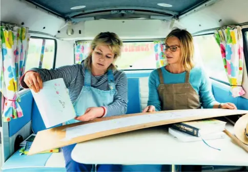  ??  ?? Taking a break in their van gives the friends a chance to discuss their work in progress and compare ideas.