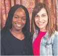  ??  ?? Hope Mbouyi, left, with her former ESL teacher Ms. Adriana Danielewic­z. Hope spoke at the 43rd annual Hamilton Community Prayer Breakfast about her family’s struggles and perseveran­ce as they moved from her native Congo to China, before finally...