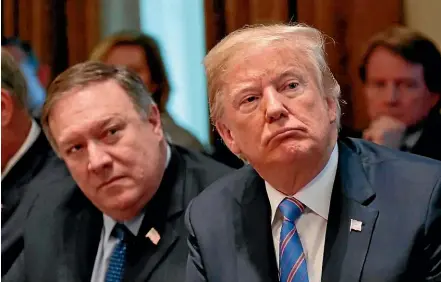  ?? AP ?? President Donald Trump and his top diplomat, Secretary of State Mike Pompeo, have told contradict­ory stories about the massive hack attack on the US government.