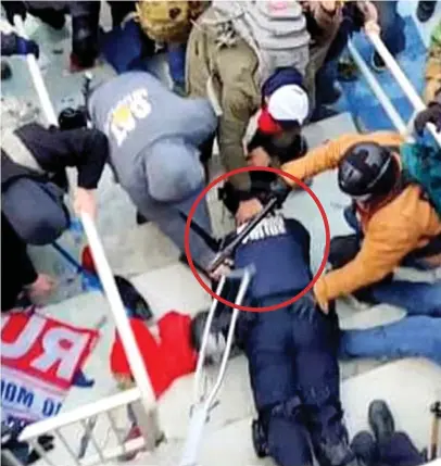  ??  ?? Disturbing footage: A police officer is beaten with a baton during last week’s US Capitol riot