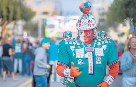  ?? JENNIFER LETT/SUN SENTINEL ?? Where's a Dolphins superfan to go for Super Bowl LIII? There are a number of sports bars, breweries and gastropubs airing the big game.