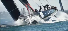  ??  ?? SYDNEY: Australian supermaxi yacht Perpetual Loyal sails through Sydney Harbour at the start of the Sydney to Hobart yacht race in Sydney yesterday. — AFP