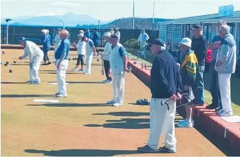  ?? Photo / Supplied ?? On-green action from Sunday’s tournament on the Taupo Bowling Club greens progressiv­e twobowl triples last Sunday.