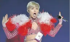  ?? Picture: GETTY IMAGES ?? IDENTITY CRISIS: Miley Cyrus on stage in Raleigh, South Carolina, last week, before she was rushed to hospital and called off her US tour