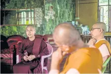  ??  ?? Ketumala takes part in a meeting at a monastery in Yangon.