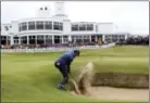  ?? PETER MORRISON — THE ASSOCIATED PRESS ?? Matt Kuchar plays out of the bunker on the 18th hole during the final round of the British Open Sunday.