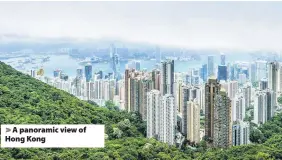  ??  ?? > A panoramic view of Hong Kong
